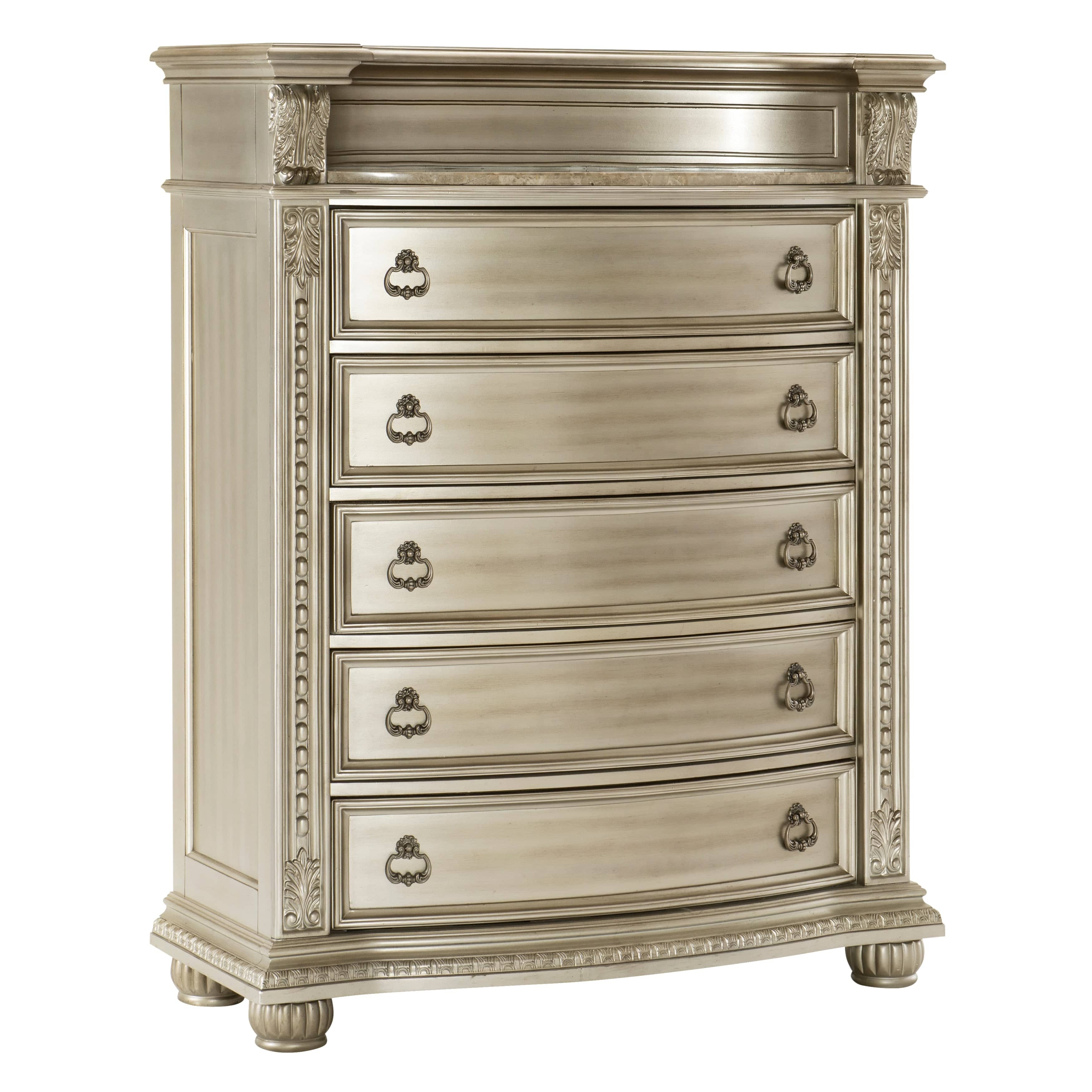 Decorative chest of drawers with ornate details on a white background