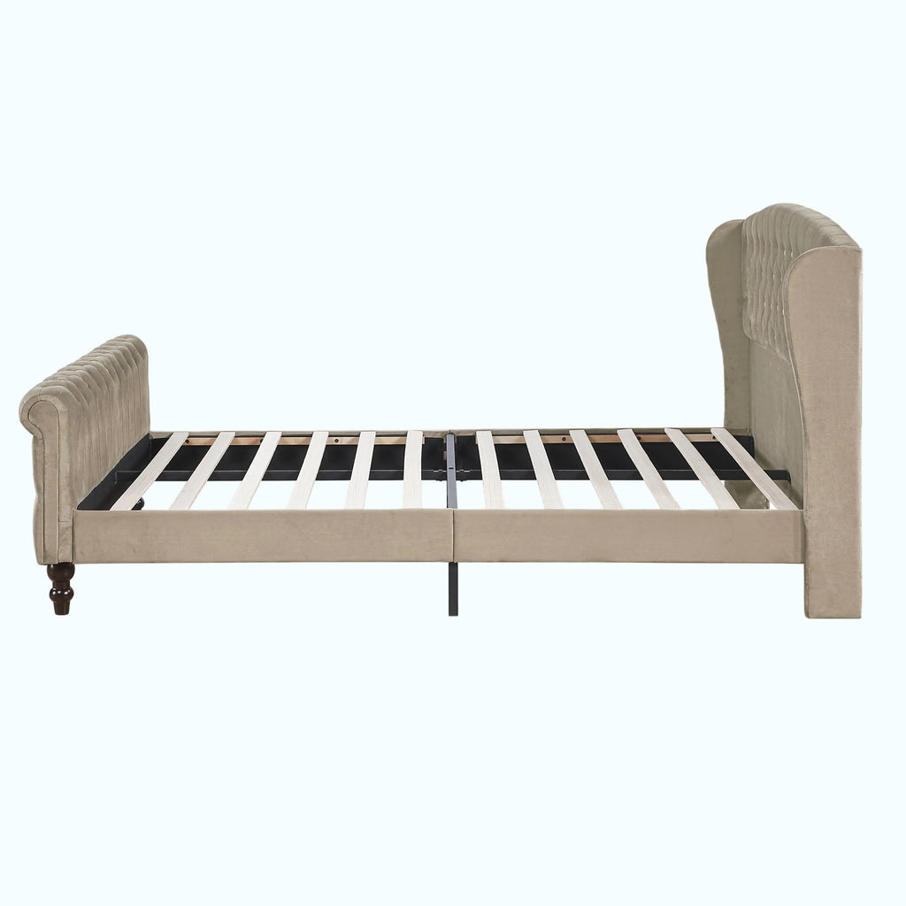 A classic twin-size upholstered bed frame with a tufted headboard and footboard, shown from the side against a plain white background.