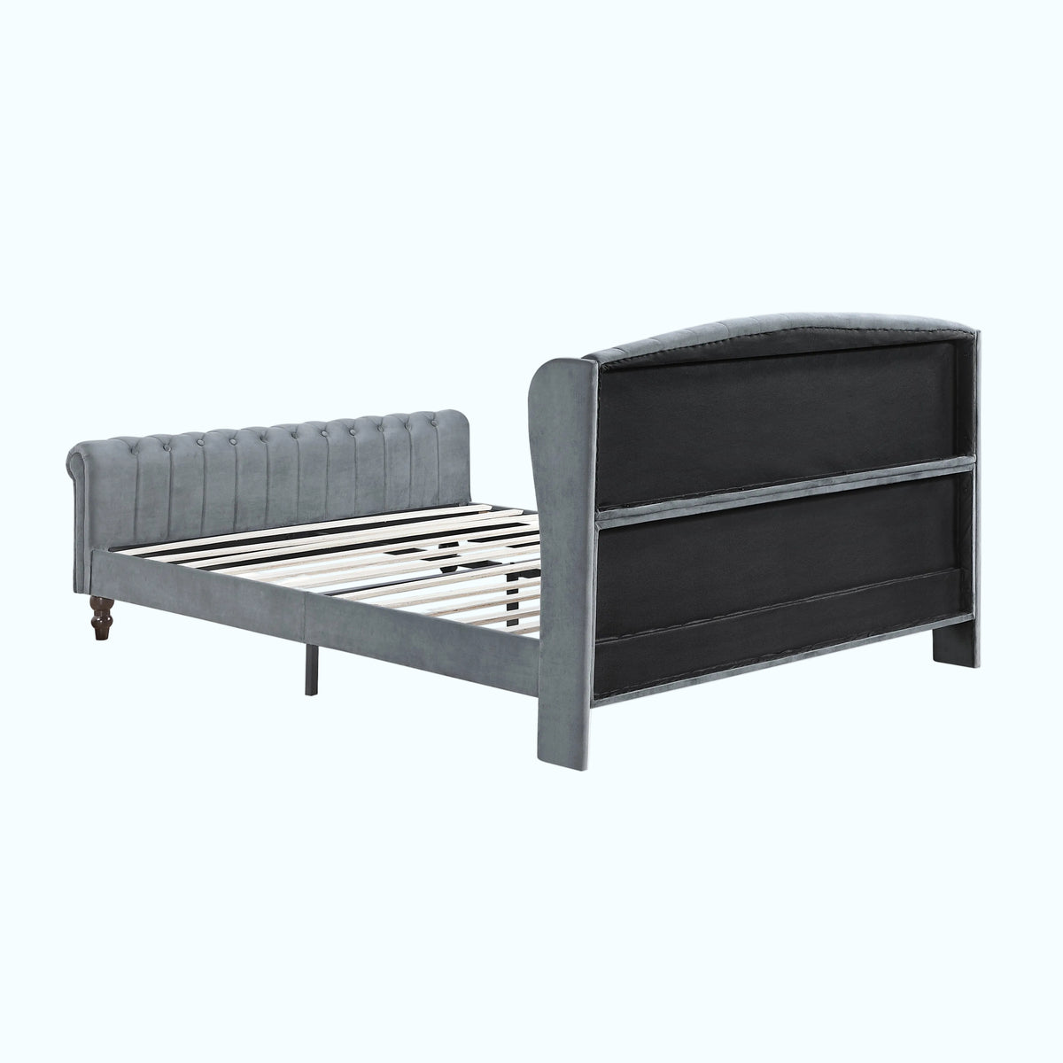 A gray upholstered bed frame with a tufted headboard and a tall, curved backboard with horizontal panel lines, shown on a plain white background.