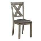 Wooden chair with a gray cushioned seat on a white background