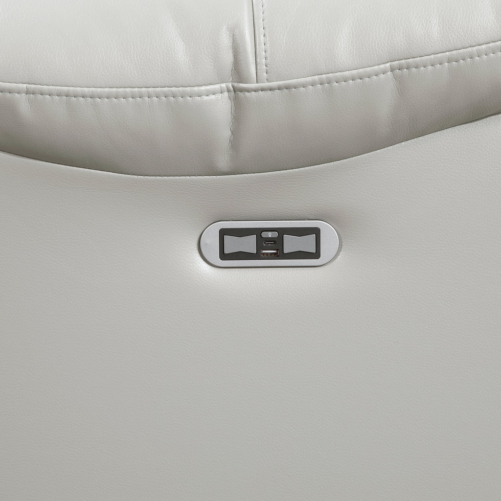 Gray cushion with a control panel featuring buttons and a display on a matching gray background.