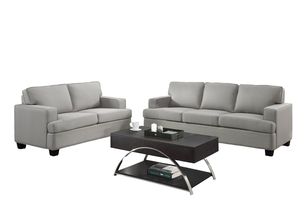 Gray sofa set in a living room with cityscape view