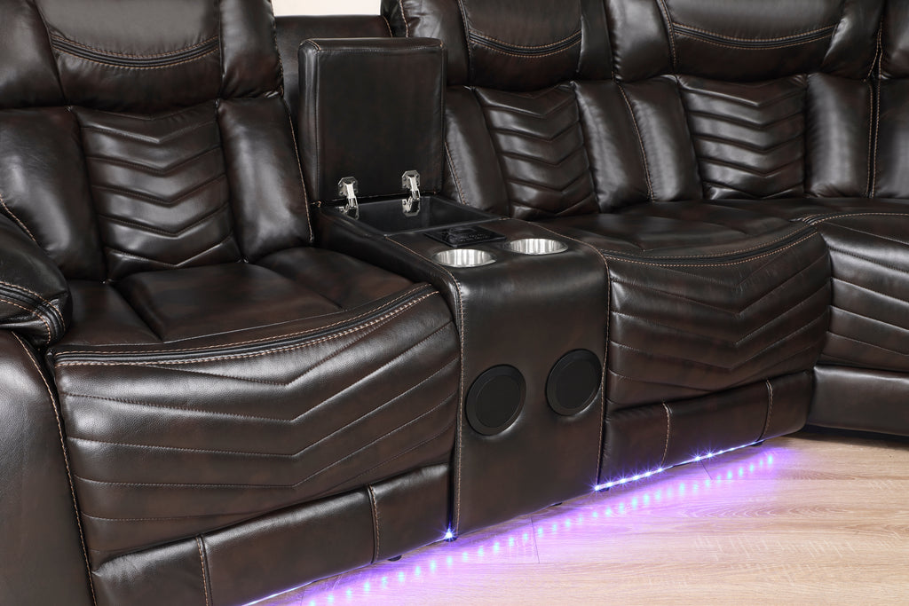 Black leather recliner with cup holders and LED lighting on a wooden floor.