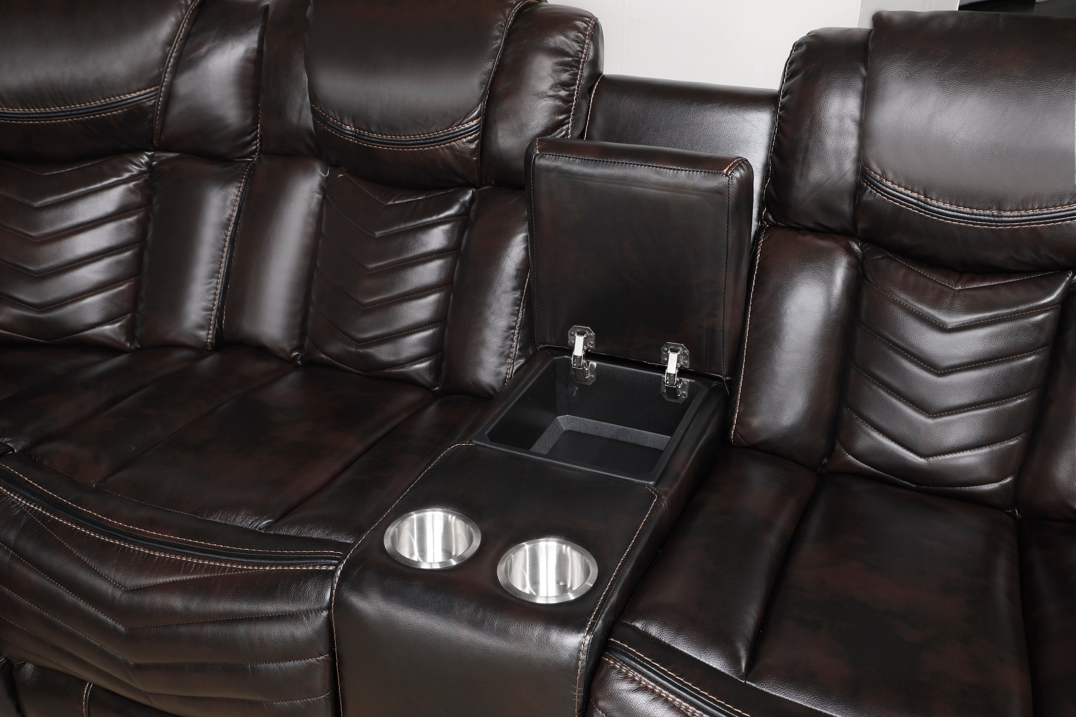 Brown leather recliner with cup holders and armrests