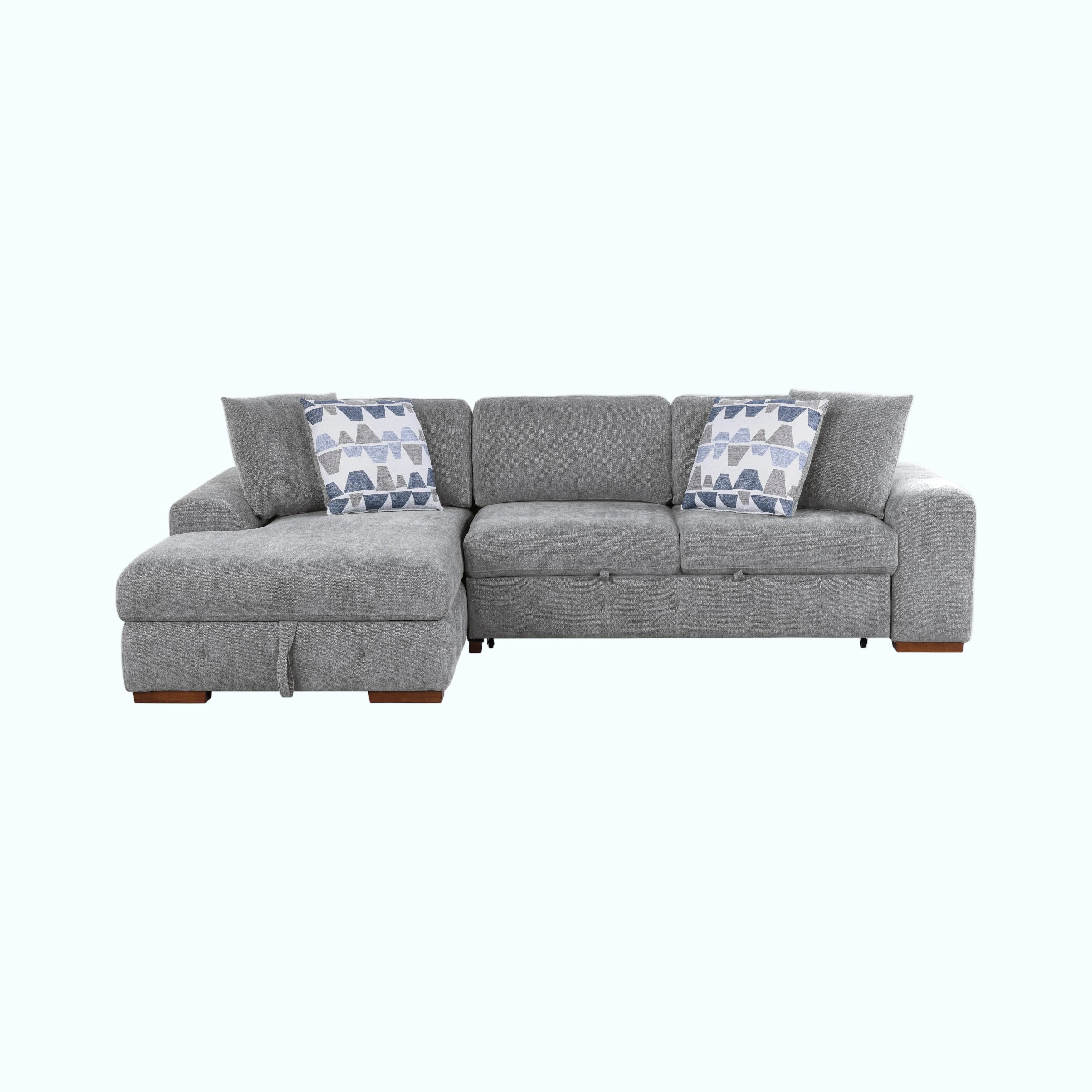 Gray sectional sofa with patterned cushions on a white background