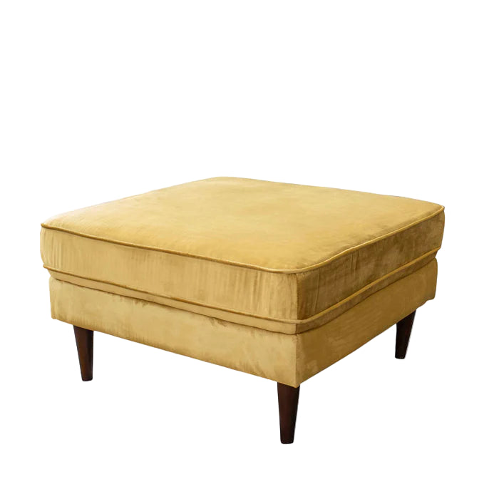 Yellow ottoman with dark wood legs on a white background