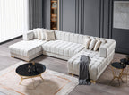 Modern white sectional sofa in a stylish living room with decor elements.