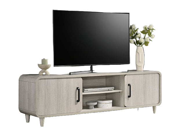 TV stand with a television, decorative items, and a vase in a living room setting.