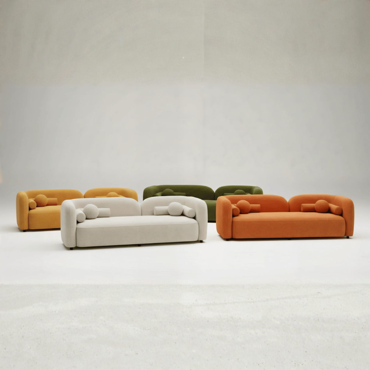 Set of colorful sofas on a plain background