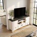 White TV stand with a black television in a living room setting.