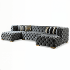 Gray tufted sectional sofa on a white background