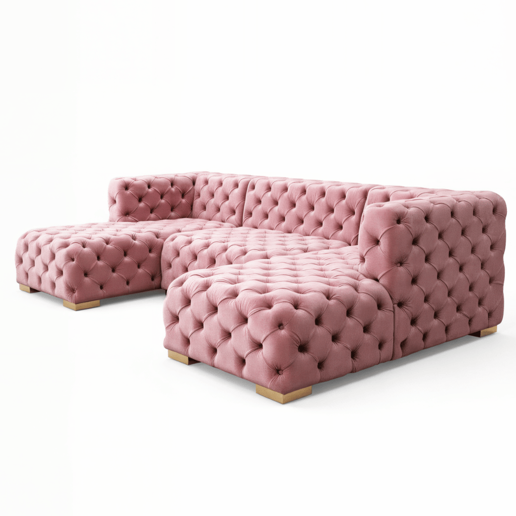 Pink tufted sofa on a white background