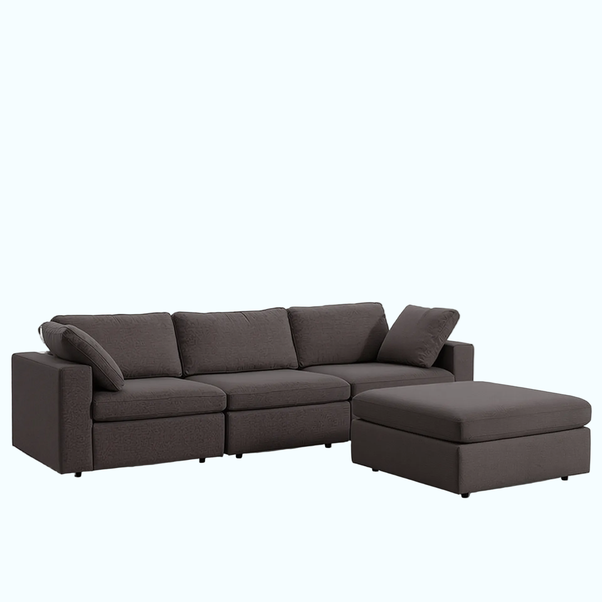 Brown sectional sofa with ottoman on a white background