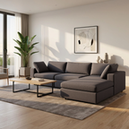 Modern living room with a gray sectional sofa, coffee table, and decorative elements.