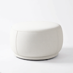 White round ottoman on a white background