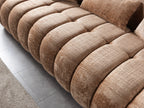 Brown textured sofa on a light gray floor