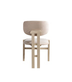 Beige chair with wooden legs on a white background
