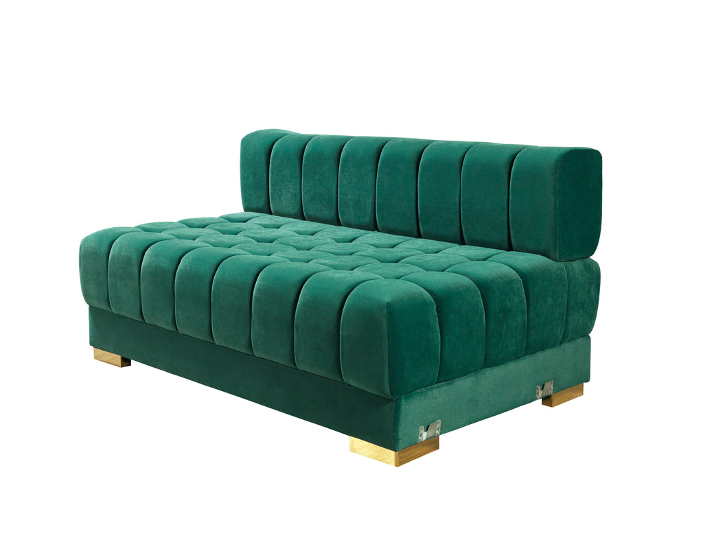 Green tufted sofa on a white background