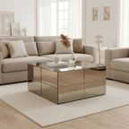 Modern living room with a beige sectional sofa and a mirrored coffee table.
