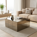 Modern living room with a reflective coffee table, beige sofa, and decorative elements.