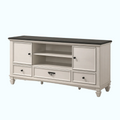 White entertainment console with black top on a white background