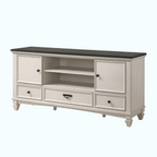 White entertainment console with black top on a white background