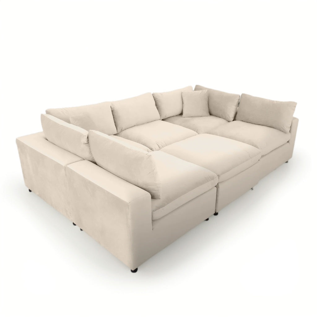 Beige modular sectional sofa on a white background