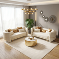 Modern living room with beige sofas, a gold coffee table, and decorative elements.