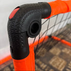 Close-up of a black and orange metal corner bracket on a white background