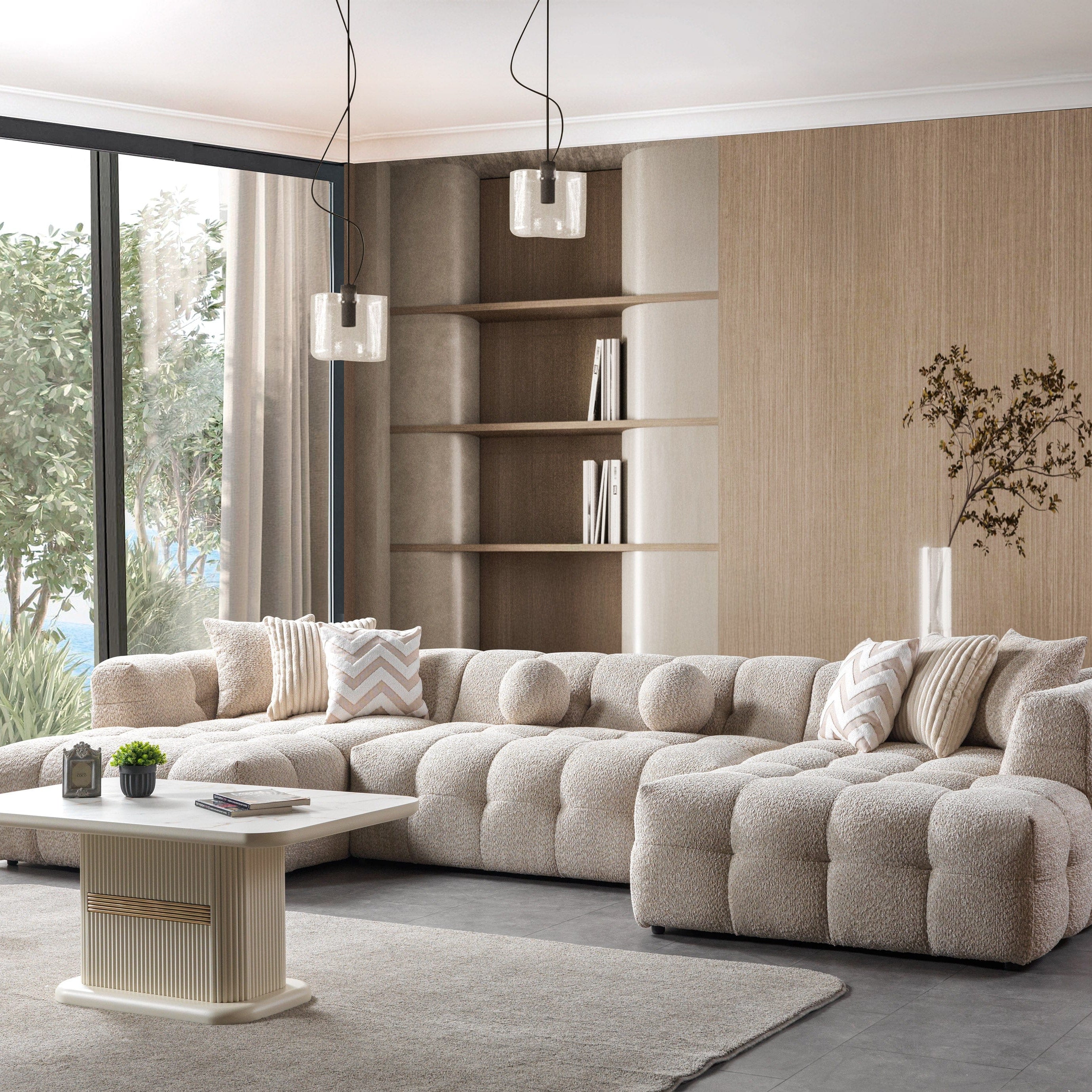 Modern living room with a large beige sectional sofa, coffee table, and decorative elements.