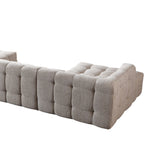 Gray tufted bench on a white background