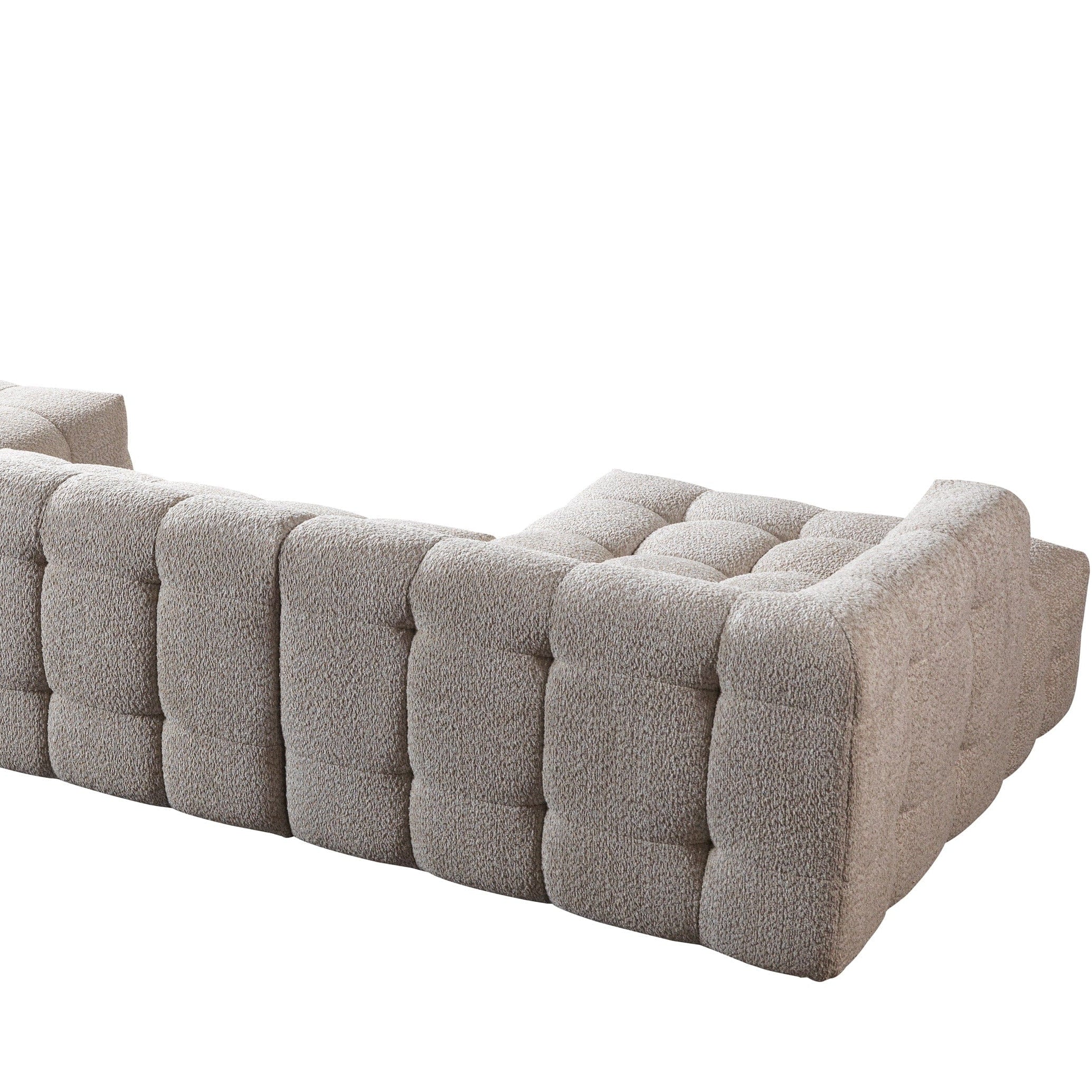 Gray tufted bench on a white background