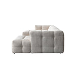 Gray textured sectional sofa on a white background
