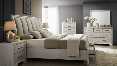 Neatly arranged bedroom with gray upholstered bed, nightstands, and dresser.