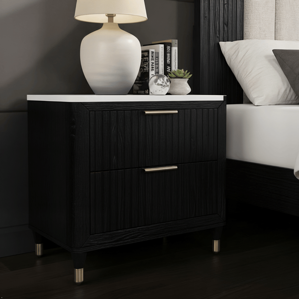 Black nightstand with white lampshade in a bedroom setting