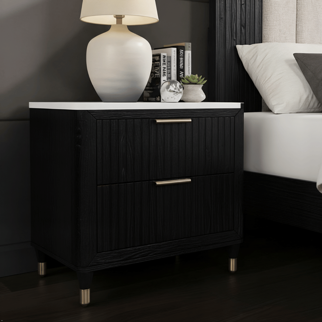 Black nightstand with white lampshade in a bedroom setting