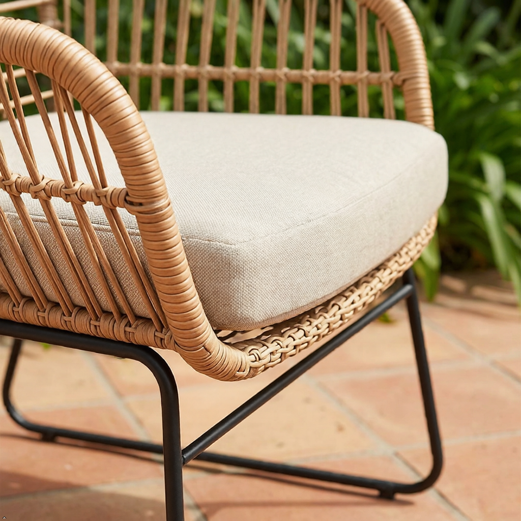 Wicker chair with a cushion on a patio