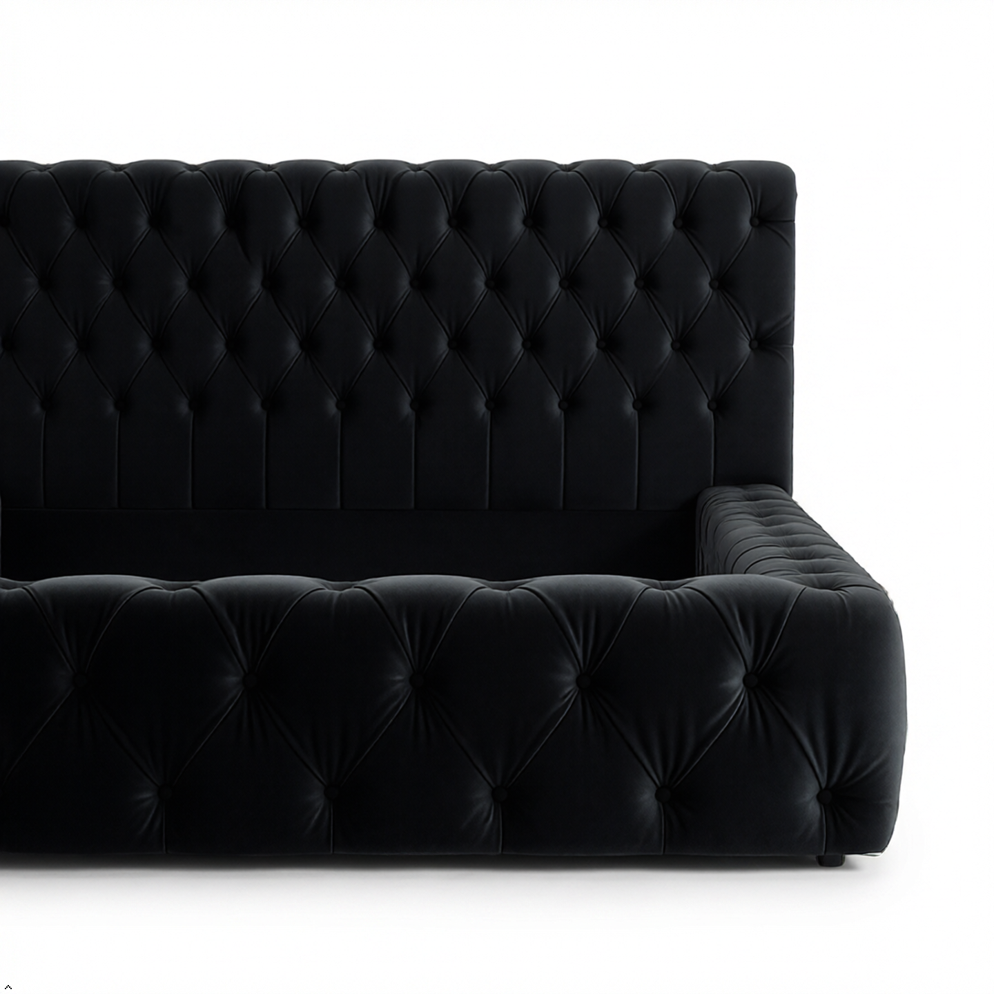 Black tufted sofa on a white background