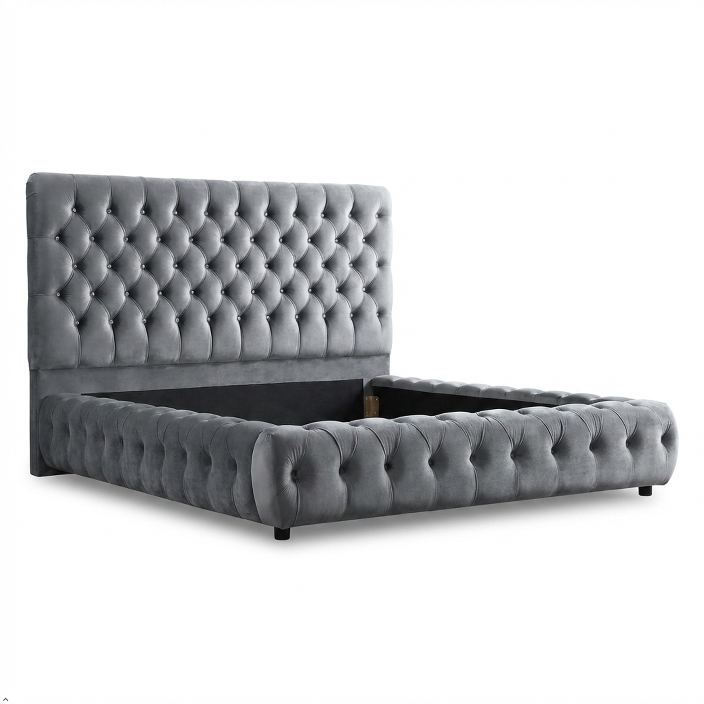 Gray tufted bed with a white background