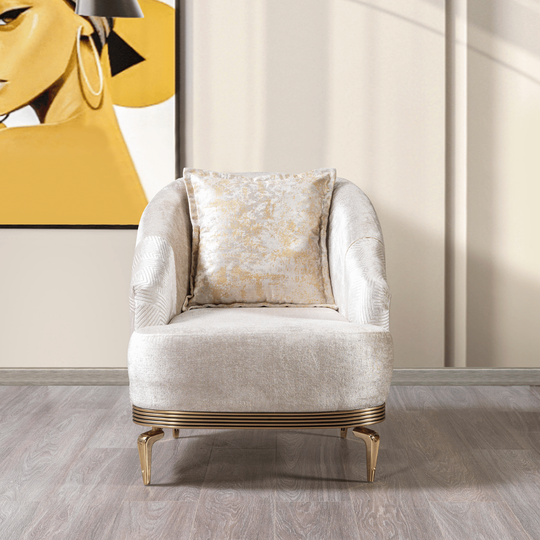 Elegant armchair with a decorative pillow in a stylish room with a yellow abstract painting.