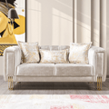 Beige sofa with decorative pillows in a stylish living room setting