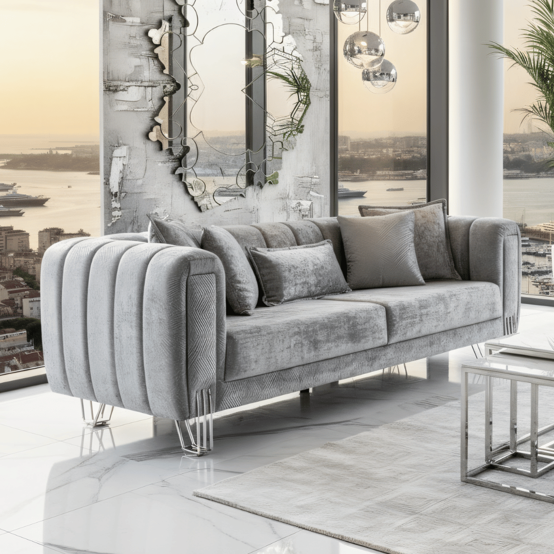 Gray sofa in a modern living room with large mirrors and cityscape view.