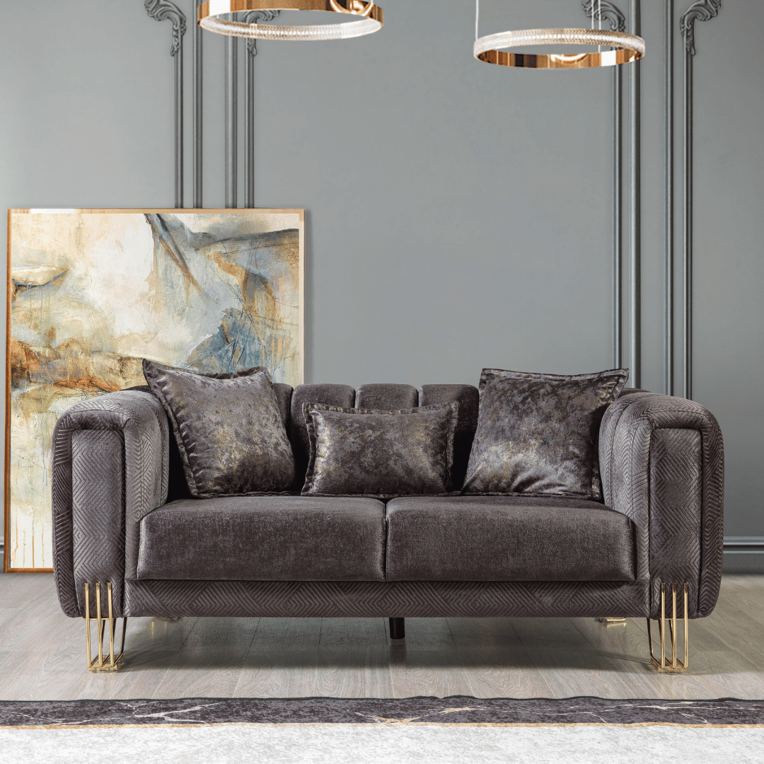Gray sofa with gold legs in a modern living room setting
