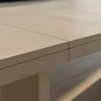 Close-up of a wooden table with a focus on the edge and grain details.