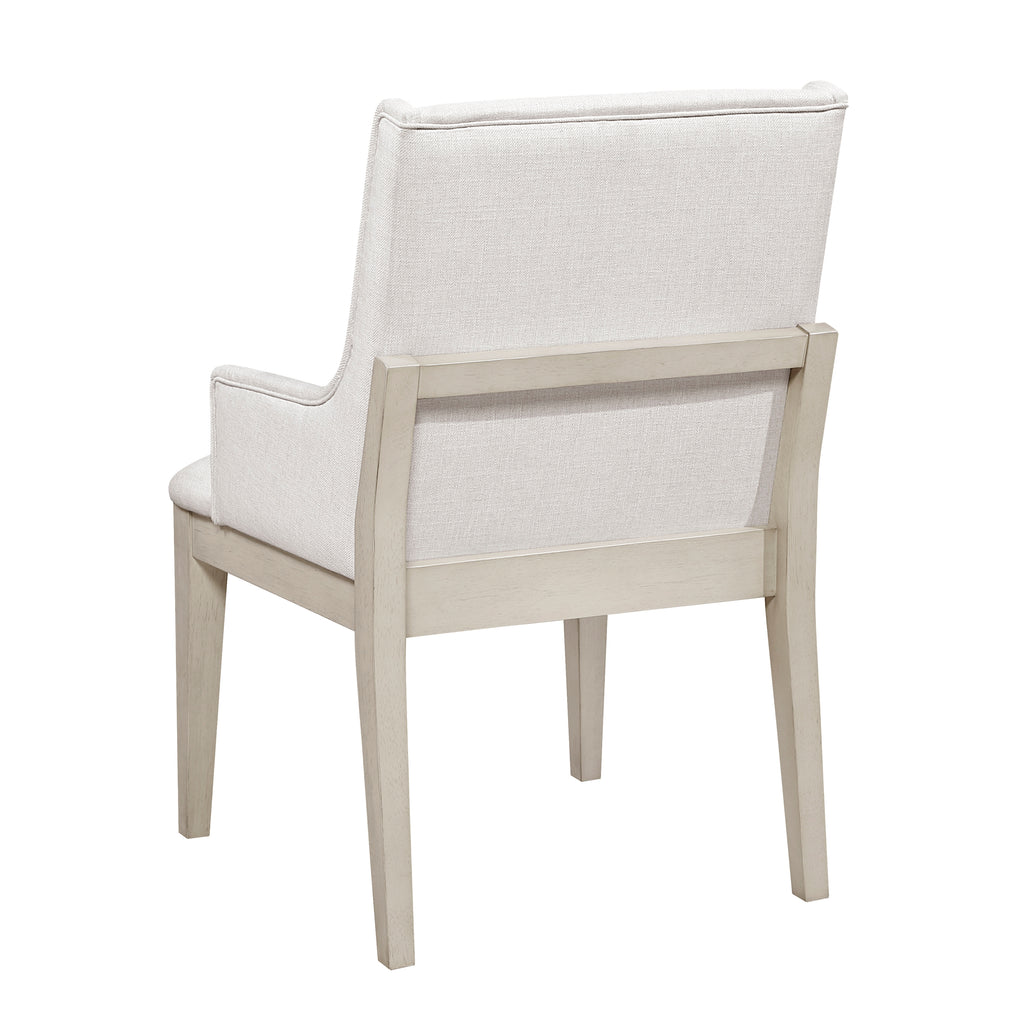 White upholstered chair with light wood frame on a white background