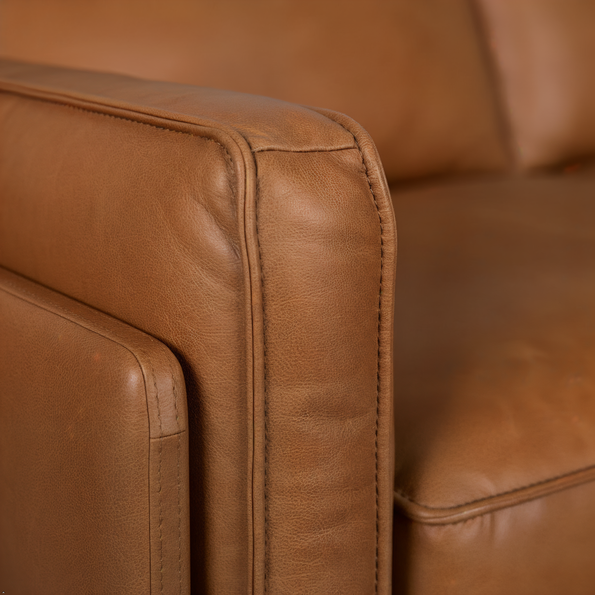 Close-up of a brown leather armchair