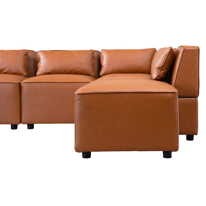 Brown leather sectional sofa on a white background