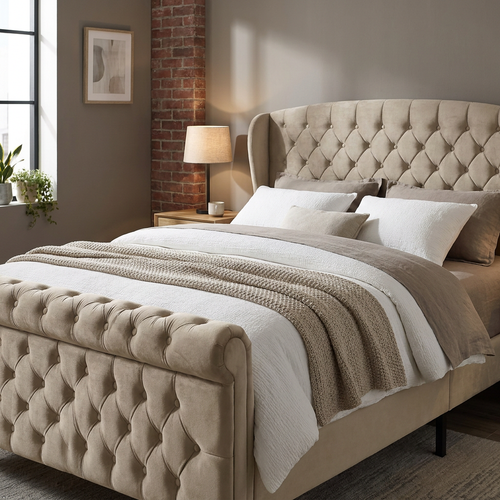 A beige upholstered bed with a tufted wingback headboard and matching footboard, styled with white and taupe bedding in a modern bedroom setting.