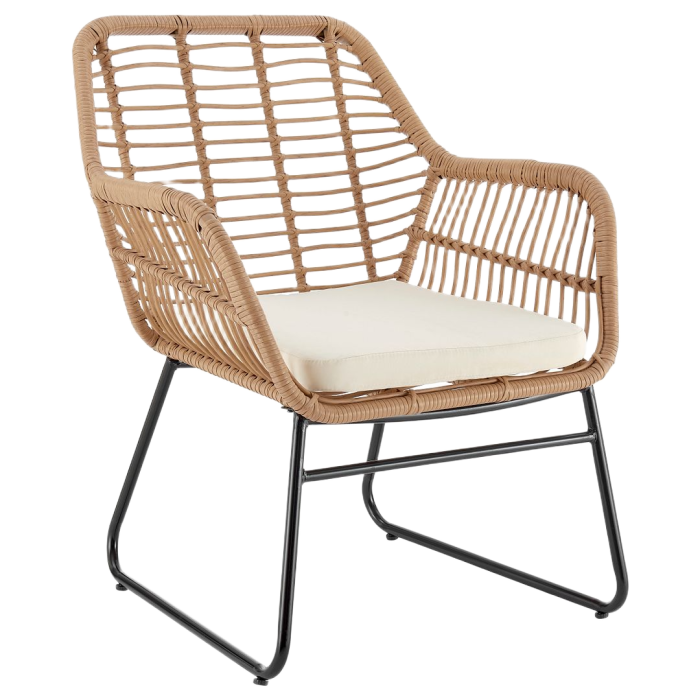 Wicker chair with a white cushion on a white background