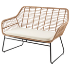 Wicker outdoor sofa with a white cushion on a white background